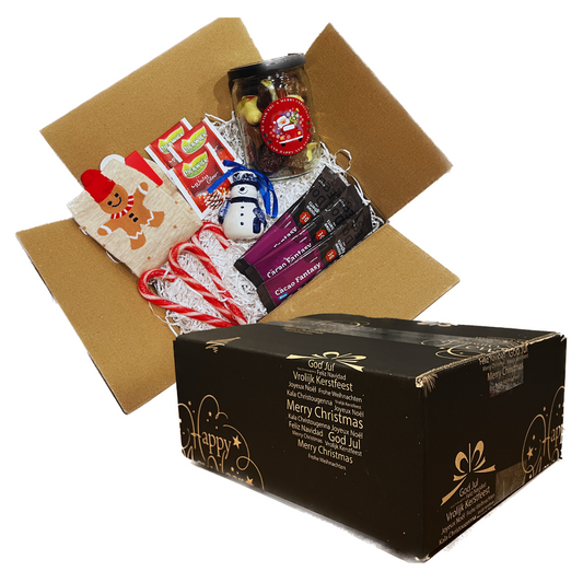 kerstpakket brievenbusdoos brievenbuscadeau brievenbus cadeau kado kerstsokken kerstman kerstkaarten kerstkaart kerstboom sneeuwpop rendier dansen verlichting chocolademelk zakje theezakje winter thee lipton luxe bonbons chocolade chocola chocolaatjes kerst 2023 feestdagen kerstperiode feestperiode zakelijk cadeau personeelscadeau partner goedkoop